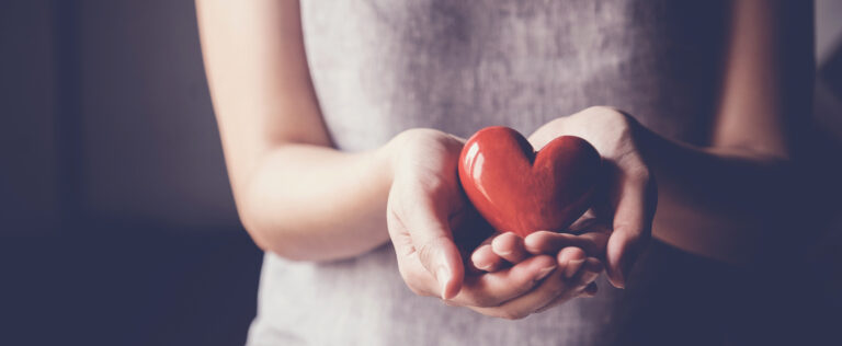 Woman holding a heart