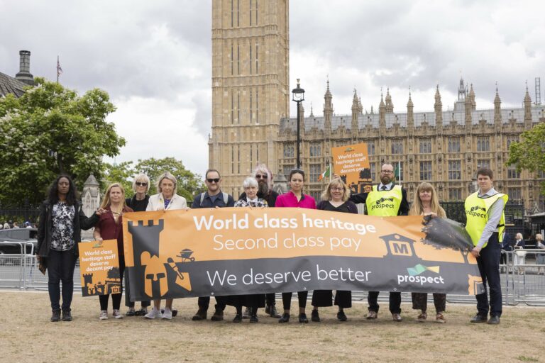 Prospect reps and members with Sue Ferns and a banner with parliament in the background
