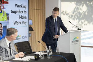 The minister addressing the panel at the event